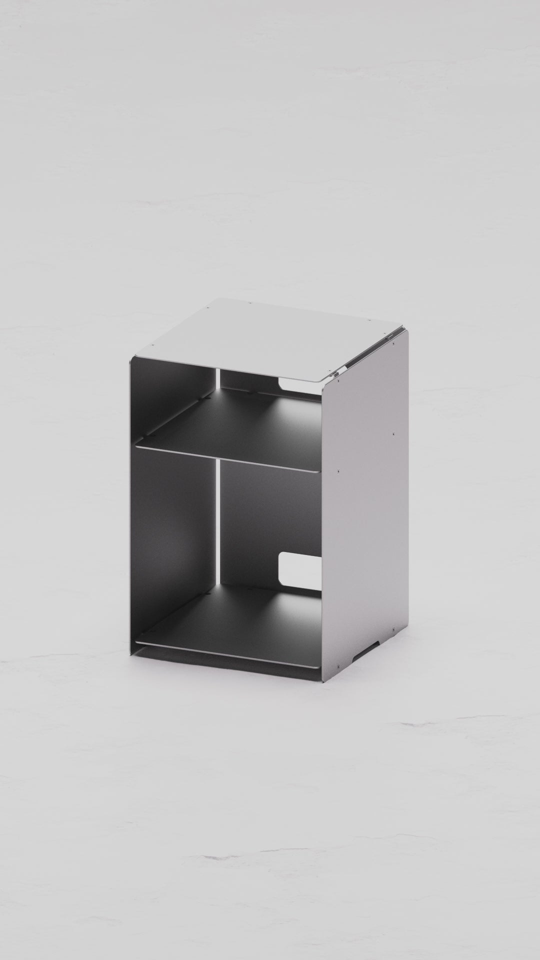 Load video: Anodised aluminum side table furniture that is sturdy and has cable management holes cut out for ease of use